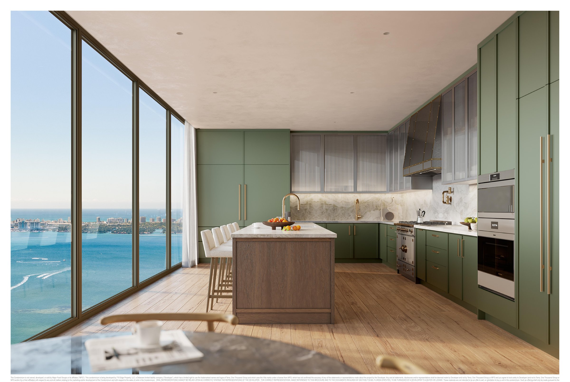 Full-floor kitchen in custom green lacquer with quartzite