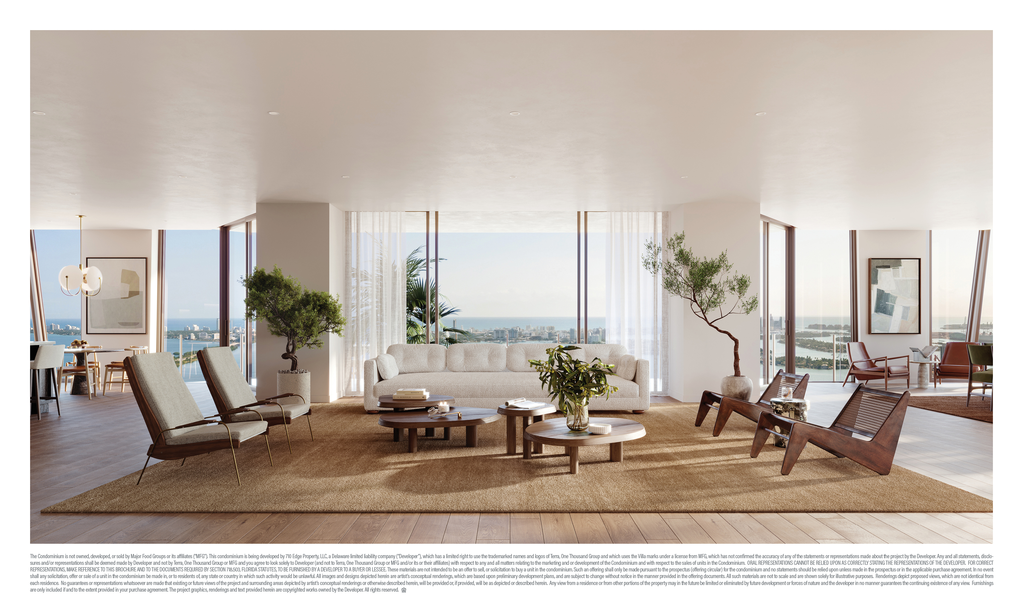 Villa Miami — gran sala de estar del dúplex Villa Doppio con vistas de doble altura a la bahía
